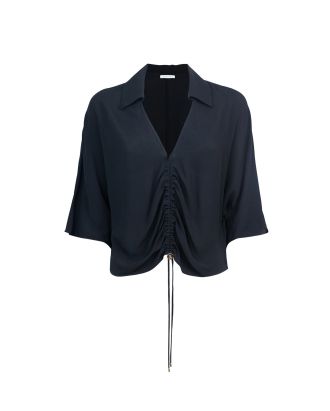 Blusa nera con arricciatura