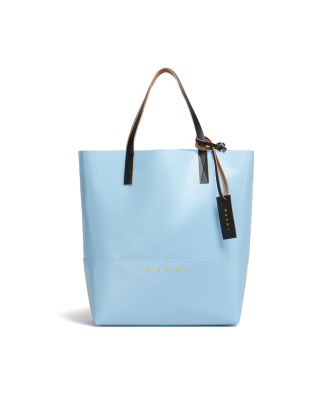 Borsa shopping azzurra con targhetta con logo